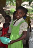 Girl waiting for lunch in Ghana